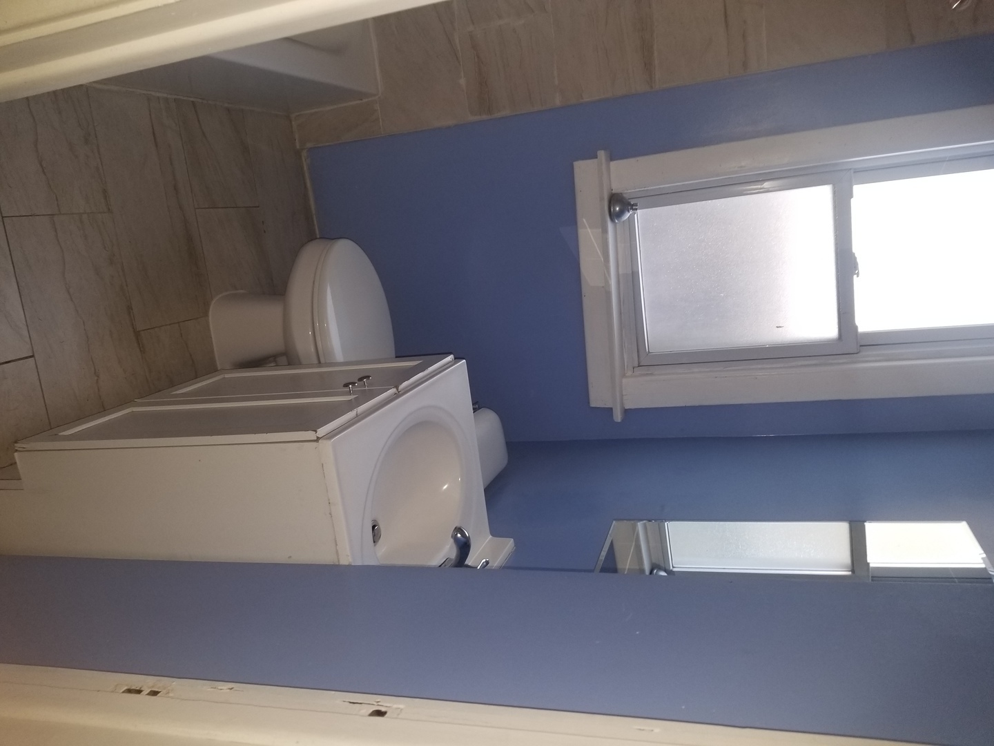 2453 West 46th Place, Unit 1 Chicago, IL 60632 - Photo 8 of 14 a utility room with dryer and washer