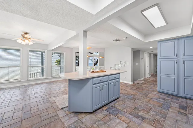 a bathroom with a sink and a large mirror