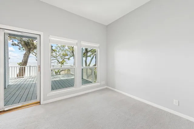 a bathroom with a toilet and a bathtub