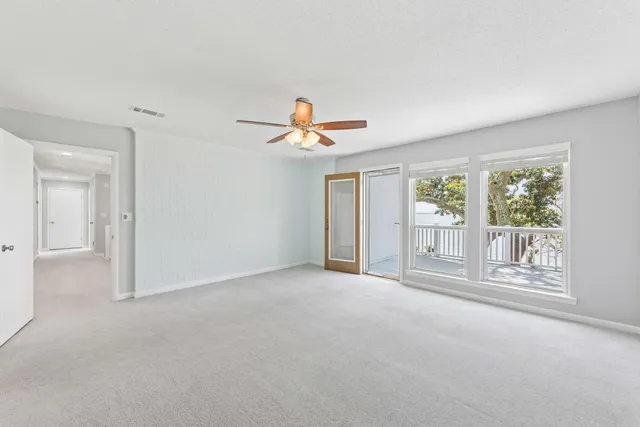 a view of balcony and yard