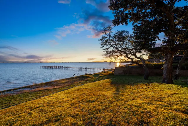 a view of a porch with wooden floor