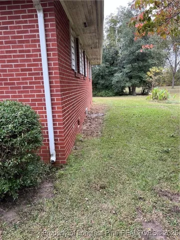 a view of a backyard with garden