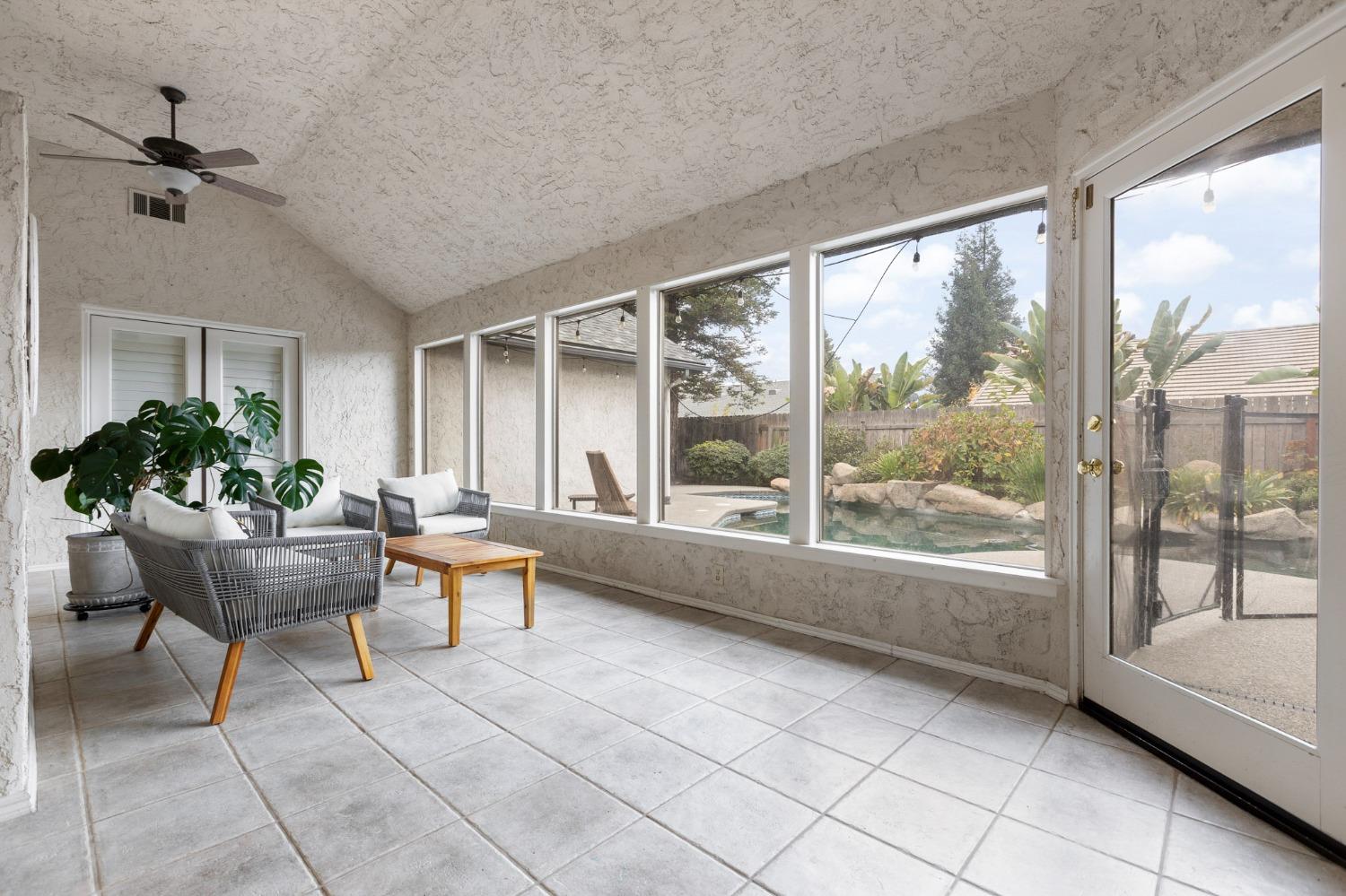 2128 Swift Avenue Clovis, CA 93611 - Photo 20 of 25 a living room with furniture and a large window