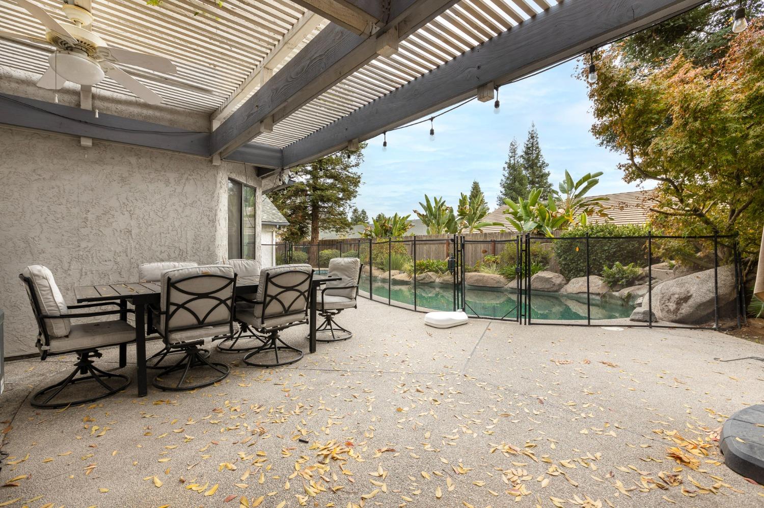 2128 Swift Avenue Clovis, CA 93611 - Photo 21 of 25 a view of a backyard with sitting area