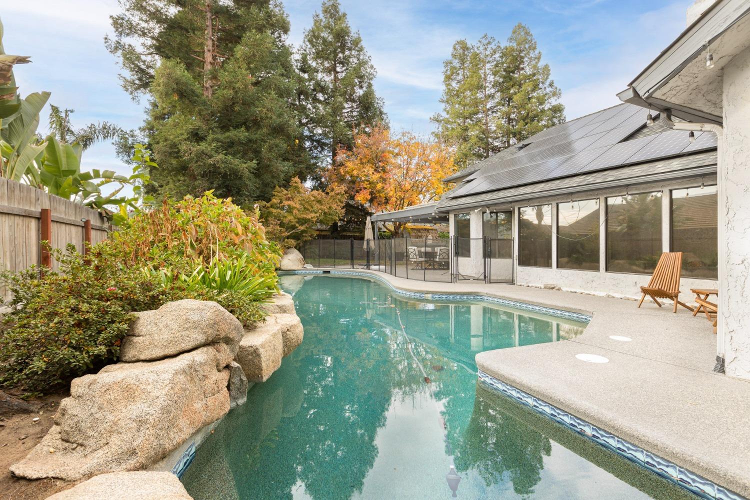 2128 Swift Avenue Clovis, CA 93611 - Photo 23 of 25 a view of house with backyard and outdoor seating