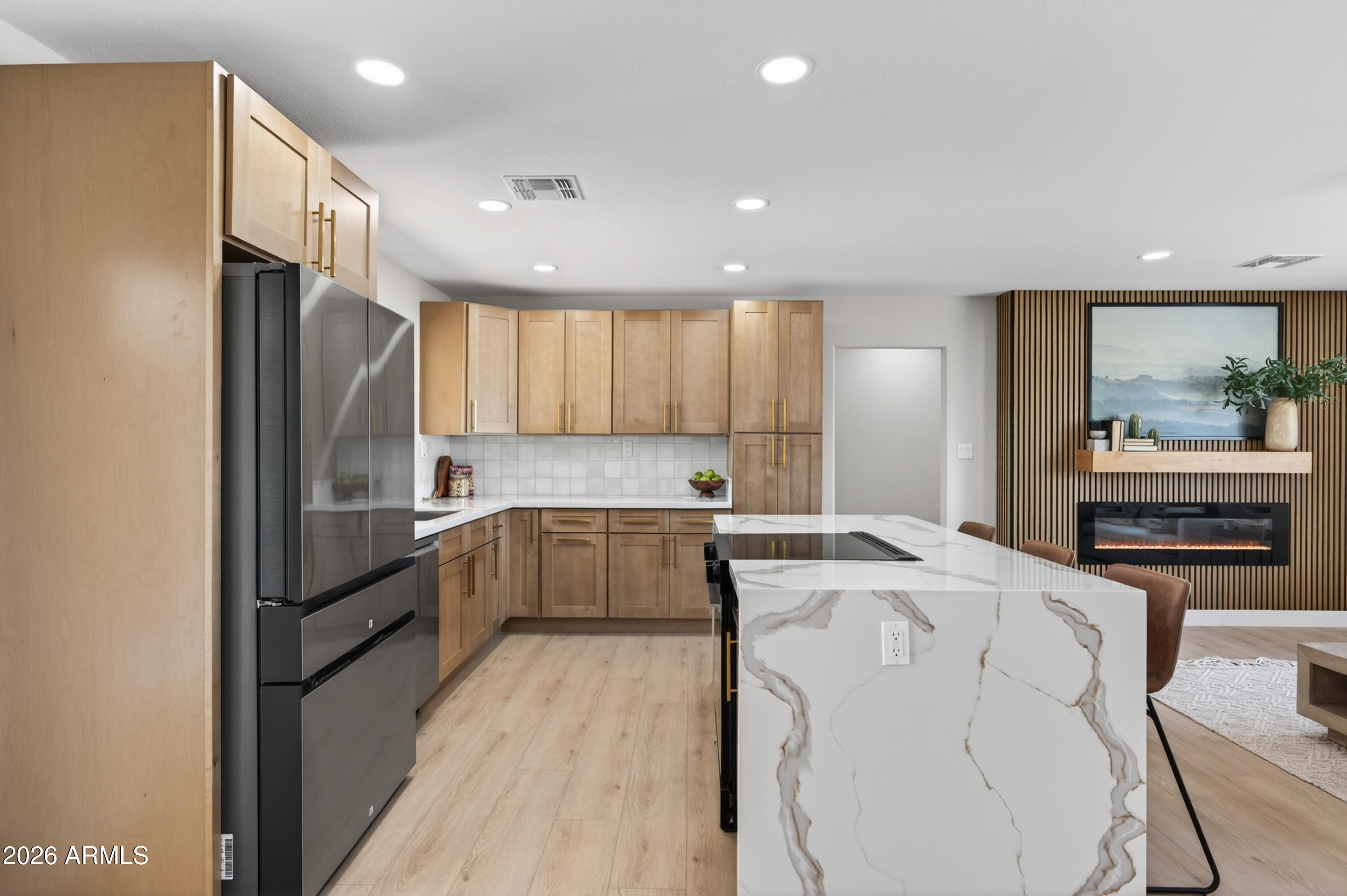 3422 South Terrace Road Tempe, AZ 85282 - Photo 5 of 43 a kitchen with a refrigerator a sink and cabinets