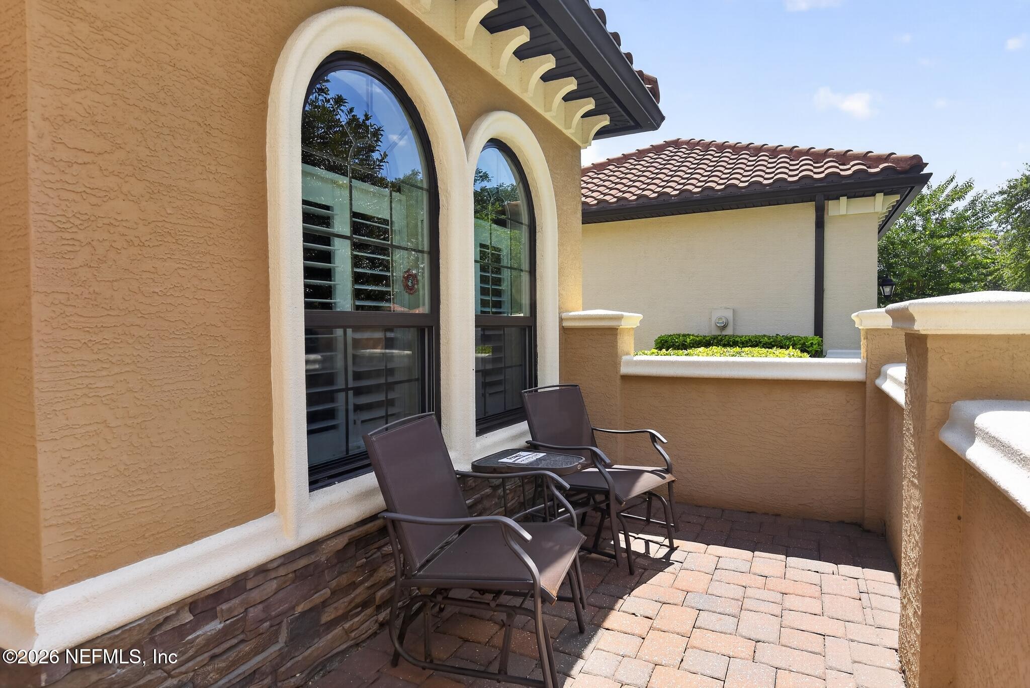 110 Vía Roma Ormond Beach, FL 32174 - Photo 40 of 43 a view of a house with backyard and sitting area