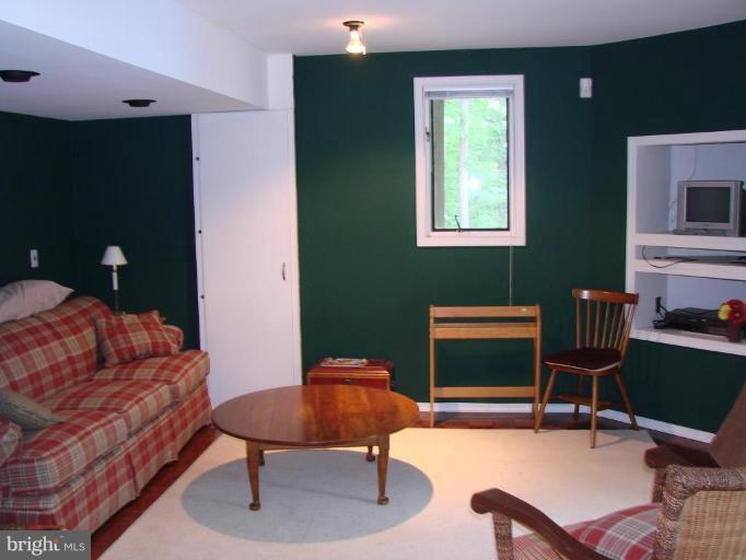 6711 Carters Run Road Marshall, VA 20115 - Photo 13 of 16 a living room with furniture and a window