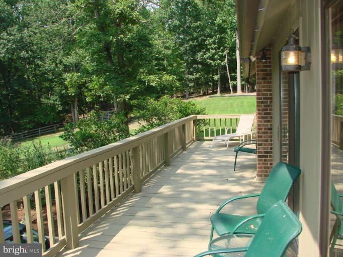 6711 Carters Run Road Marshall, VA 20115 - Photo 6 of 16 a view of balcony with wooden floor