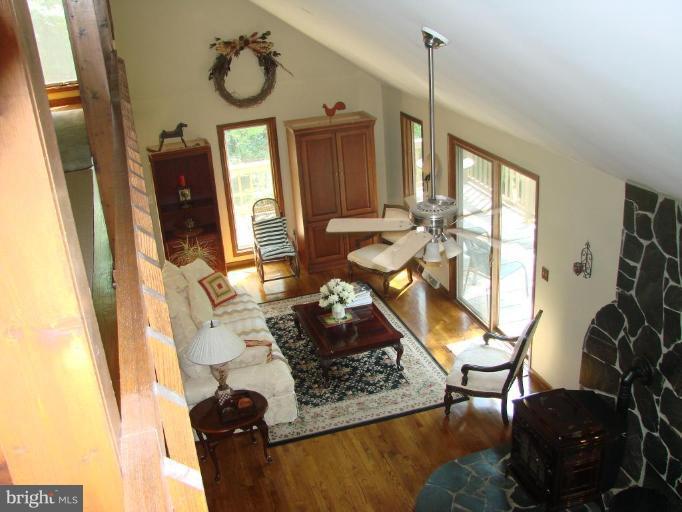6711 Carters Run Road Marshall, VA 20115 - Photo 9 of 16 a view of living room with furniture and floor to ceiling window