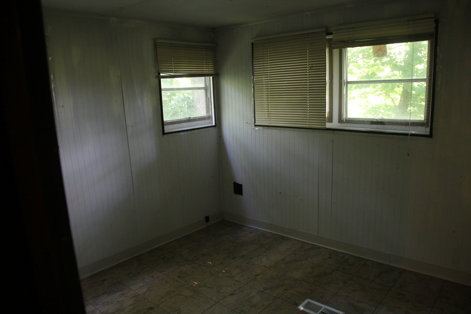 1150 N Homer, IL 61849 - Photo 24 of 32 a view of an empty room with a window