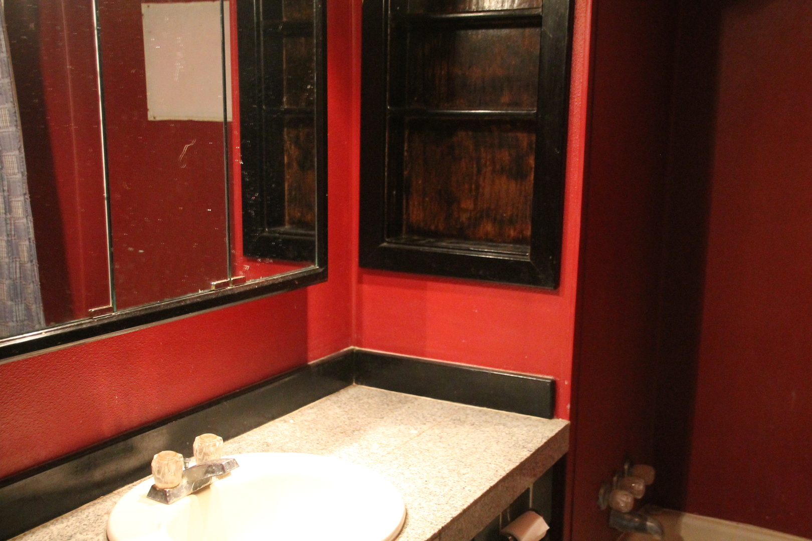 1150 N Homer, IL 61849 - Photo 31 of 32 a bathroom with a sink and a mirror