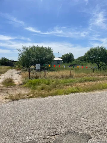 a view of lake with green space