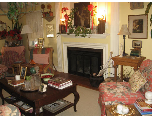 42 Sheldon Road Newton, MA 02459 - Photo 3 of 9 a living room with furniture and a fireplace
