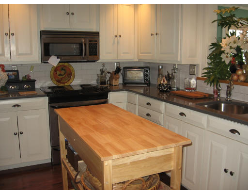 42 Sheldon Road Newton, MA 02459 - Photo 5 of 9 a kitchen with a sink and cabinets