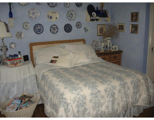 42 Sheldon Road Newton, MA 02459 - Photo 7 of 9 a bedroom with a bed and a table in it
