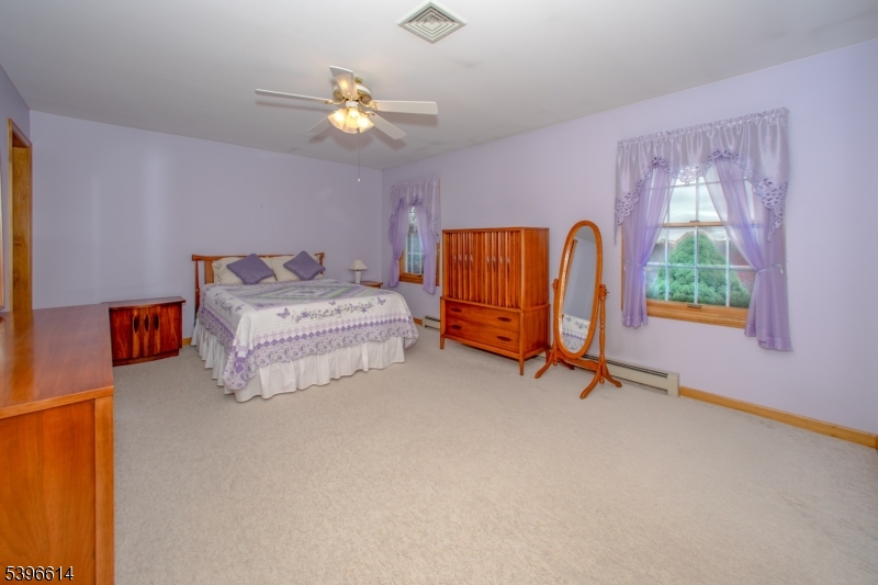 171 Mt Salem Road Wantage, NJ 07461 - Photo 15 of 38 a bedroom with bed and a window