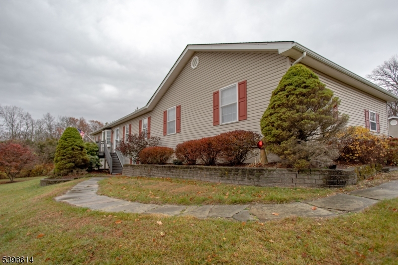 171 Mt Salem Road Wantage, NJ 07461 - Photo 2 of 38 a front view of a house with a yard