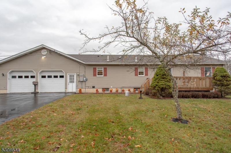 171 Mt Salem Road Wantage, NJ 07461 - Photo 29 of 38 a view of a house with a yard and garage