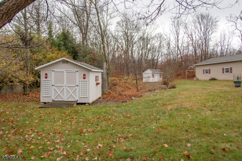 171 Mt Salem Road Wantage, NJ 07461 - Photo 30 of 38 a view of a house with a yard and garage