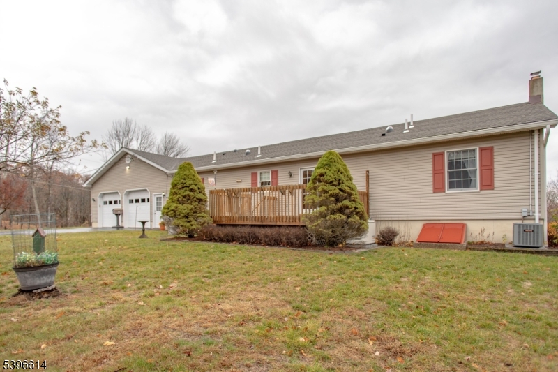171 Mt Salem Road Wantage, NJ 07461 - Photo 37 of 38 a view of a house with a yard and garage
