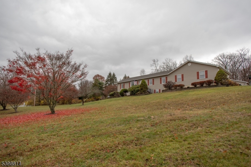 171 Mt Salem Road Wantage, NJ 07461 - Photo 38 of 38 a view of an house with backyard and trees