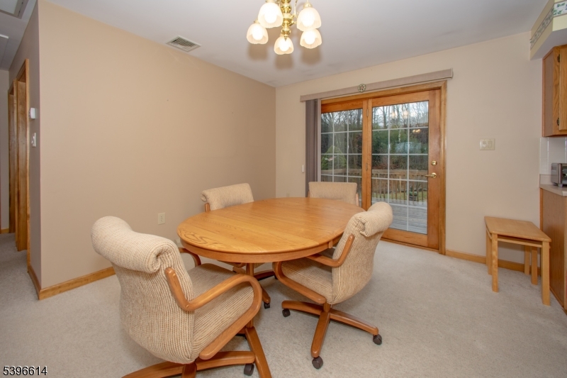 171 Mt Salem Road Wantage, NJ 07461 - Photo 7 of 38 a view of a dining room with furniture and a window