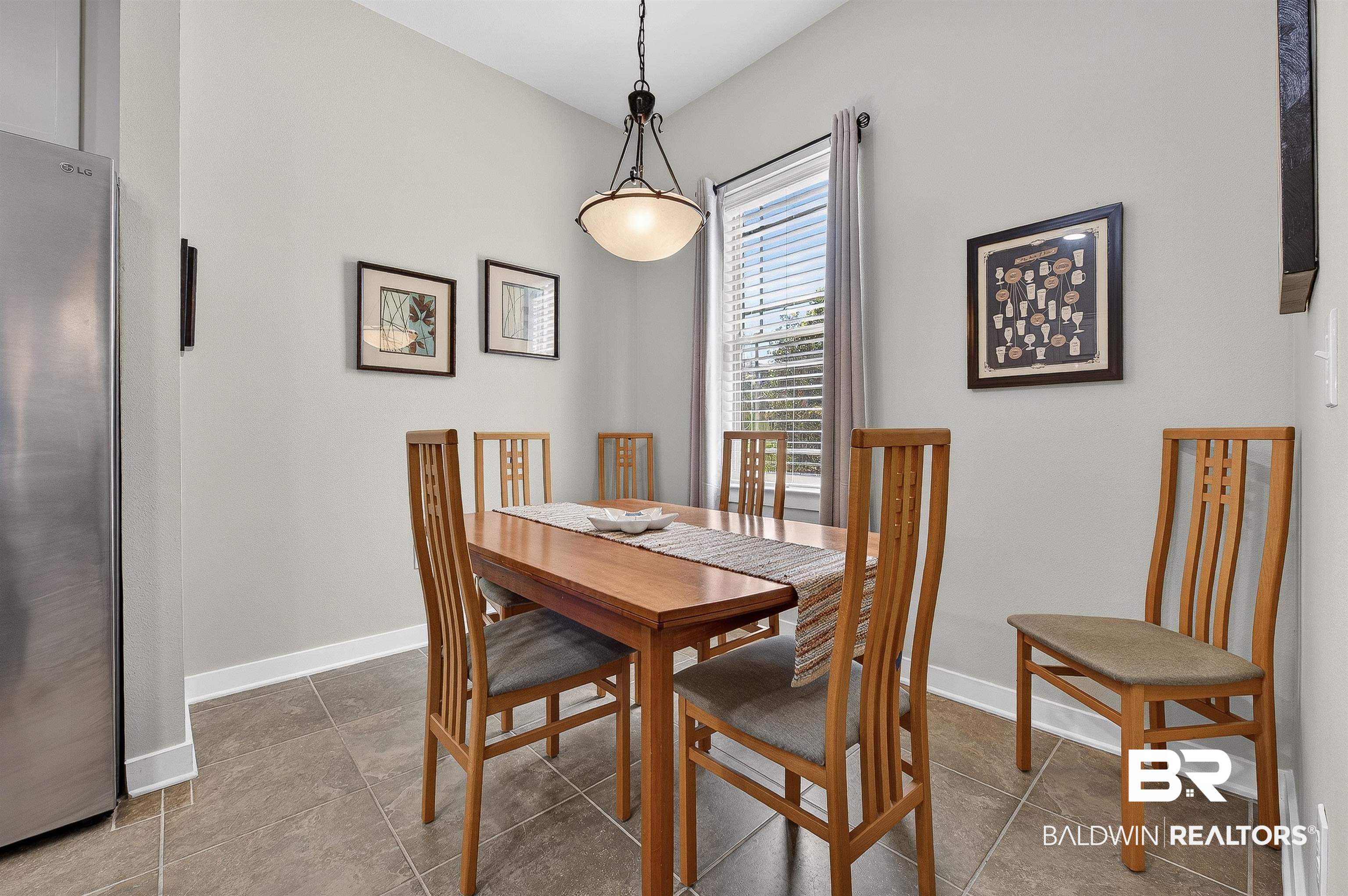 1430 West Regency Road, Unit I102 Gulf Shores, AL 36542 - Photo 12 of 31 Dining area with baseboards