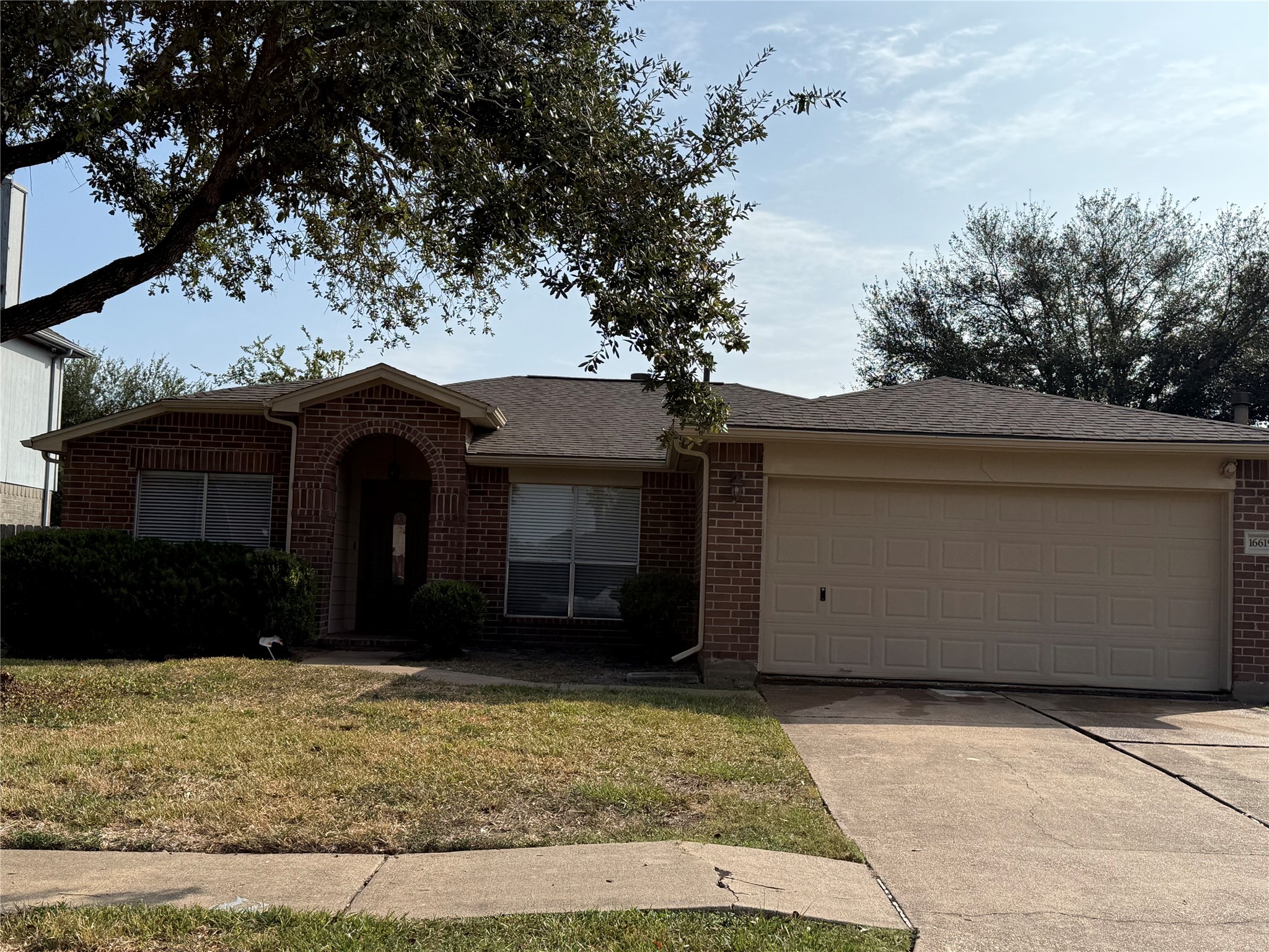 a view of house with yard