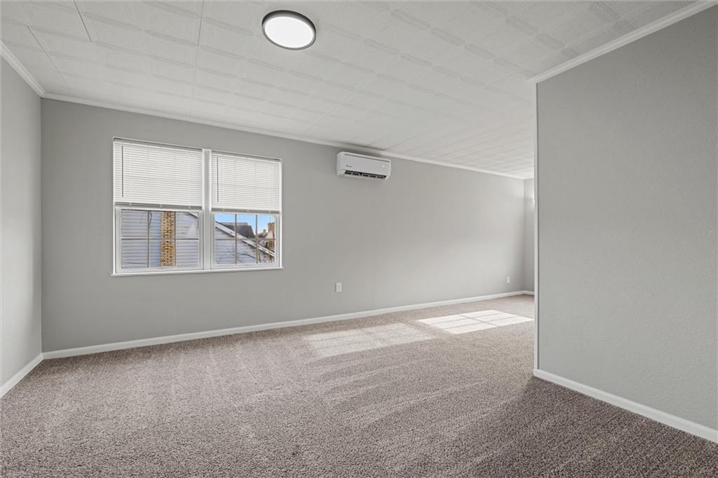 309 Beech Street Vandergrift, PA 15690 - Photo 14 of 47 an empty room with windows and closet