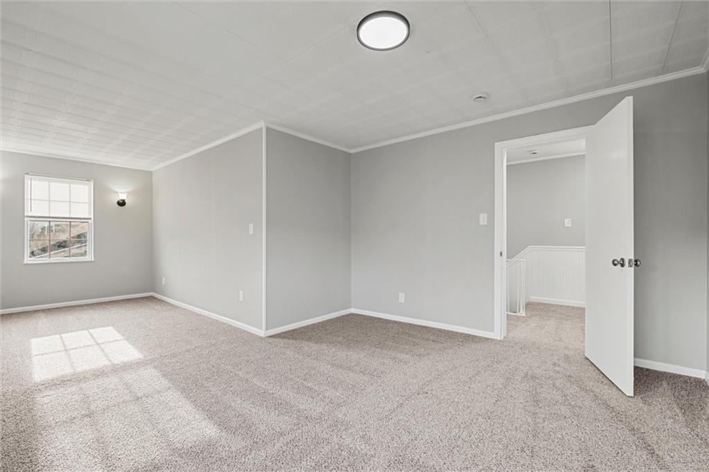 309 Beech Street Vandergrift, PA 15690 - Photo 15 of 47 an empty room with windows