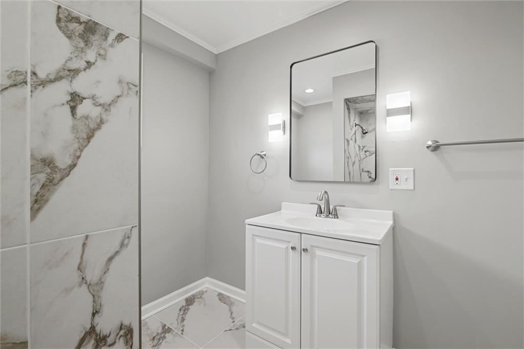 309 Beech Street Vandergrift, PA 15690 - Photo 19 of 47 a bathroom with a sink and a mirror