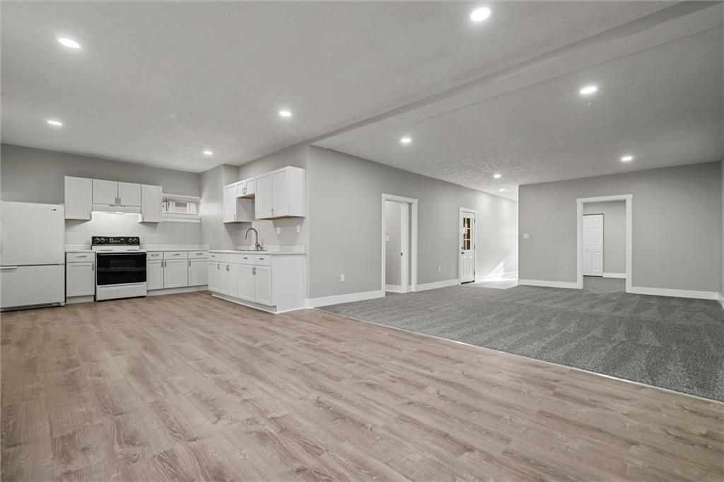 309 Beech Street Vandergrift, PA 15690 - Photo 33 of 47 a view of kitchen with refrigerator and microwave