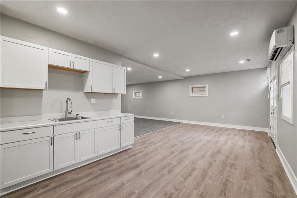 309 Beech Street Vandergrift, PA 15690 - Photo 35 of 47 a kitchen with sink and cabinets