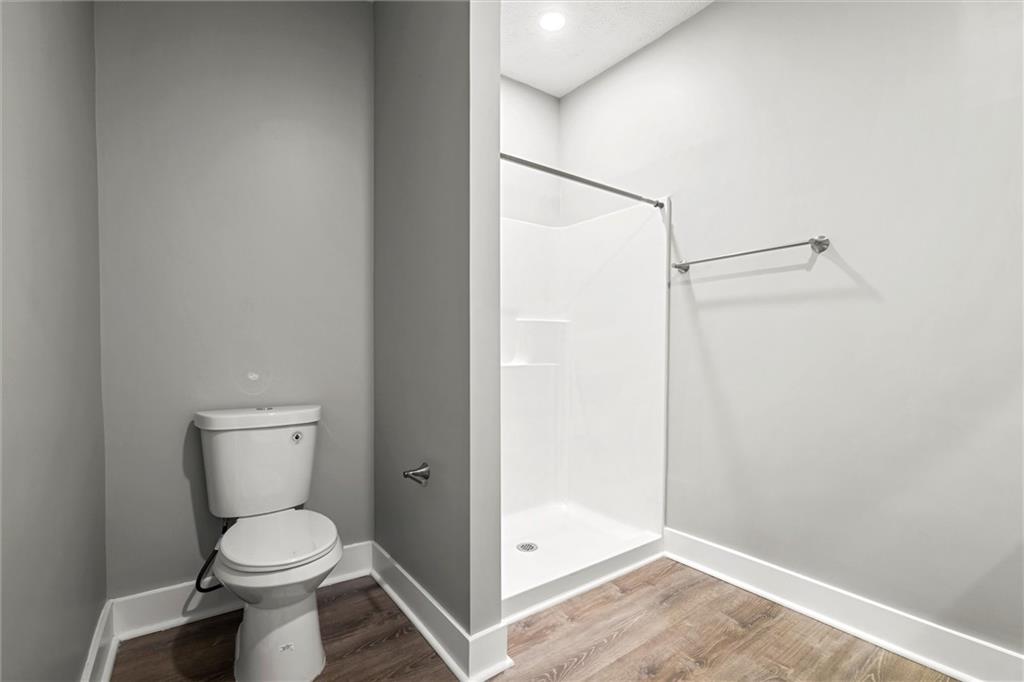 309 Beech Street Vandergrift, PA 15690 - Photo 38 of 47 a bathroom with a toilet and a shower