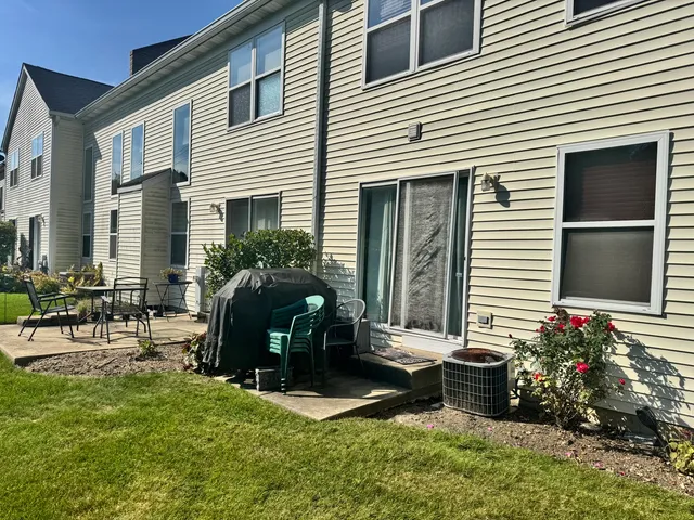 a front view of a house with patio