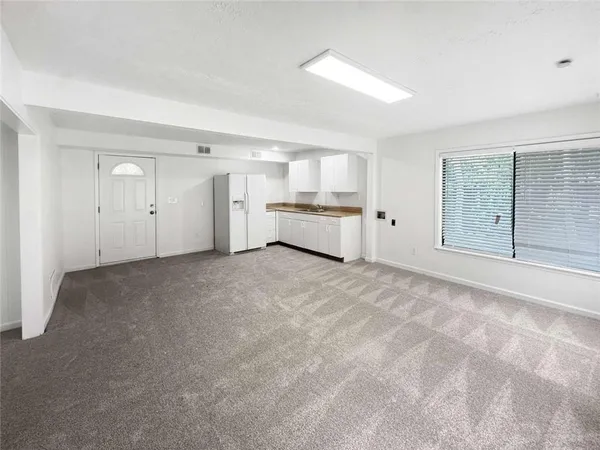 a large white room with natural light