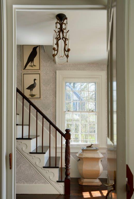 1 Twin Street Nantucket, MA 02554 - Photo 18 of 32 a view of a hallway with wooden floor and windows