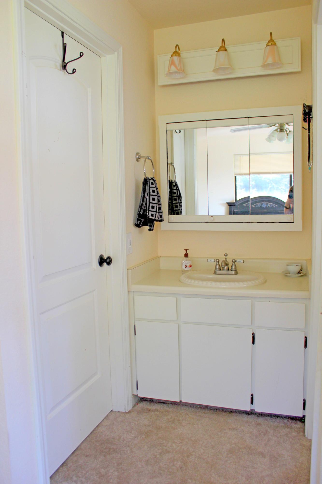 12499 Fern Road Whitmore, CA 96096 - Photo 23 of 27 a view of bathroom with dual sinks