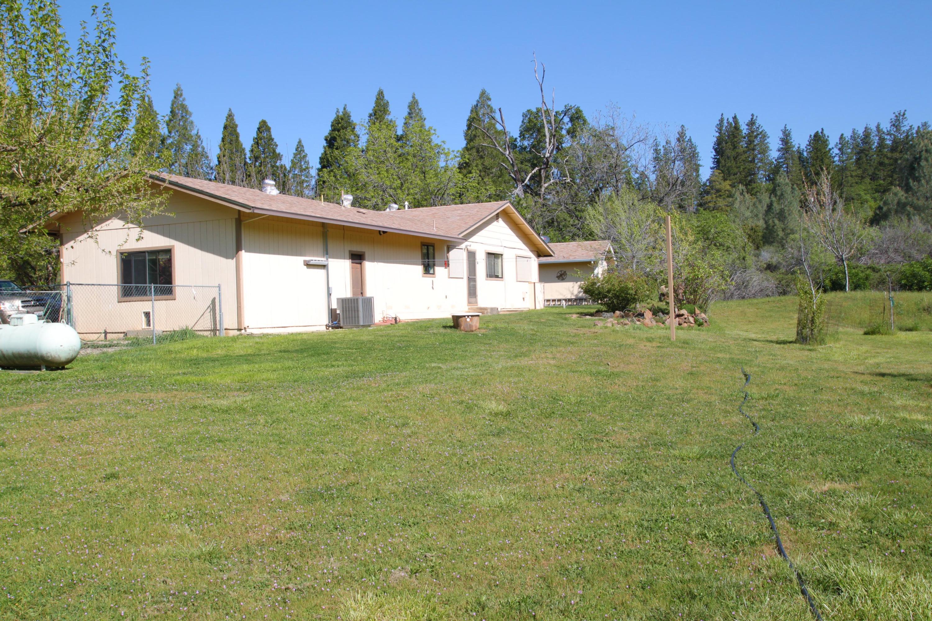 12499 Fern Road Whitmore, CA 96096 - Photo 4 of 27 a view of a house with a yard