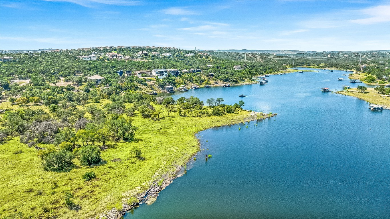 19815 Lakehurst Loop Spicewood, TX 78669 - Photo 9 of 21 a view of a lake with houses