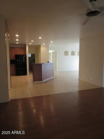 a view of a lobby with black carpet