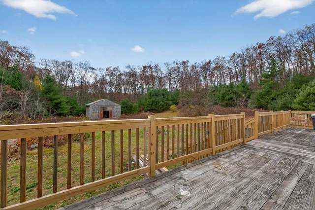 a view of a wooden roof deck