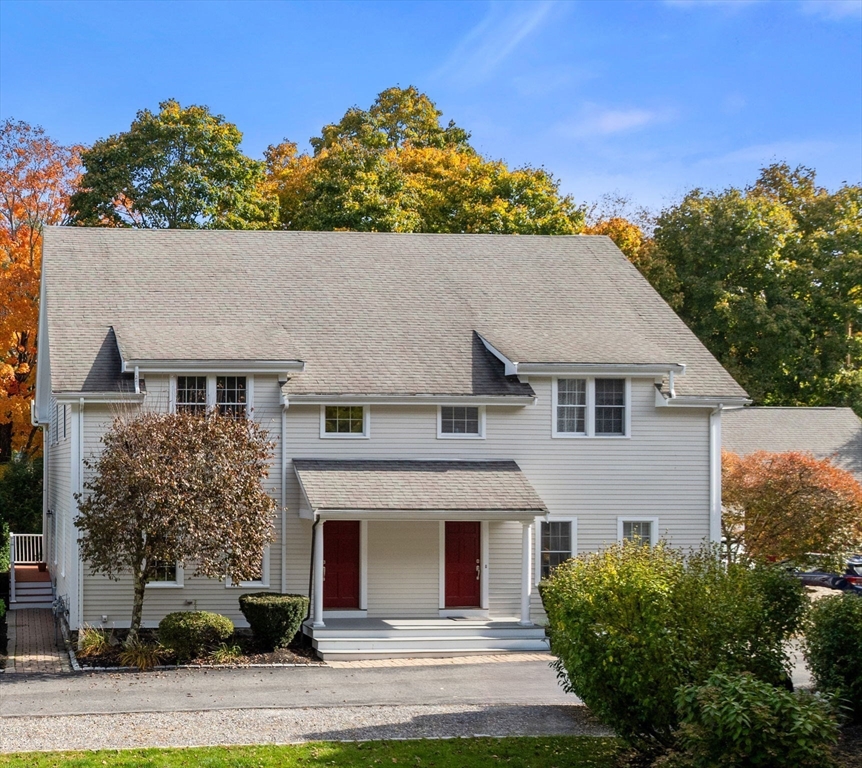 809 Boston Post Road, Unit B Weston, MA 02493 - Photo 3 of 39 front view of house with a yard