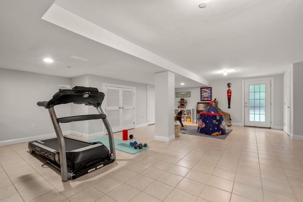 809 Boston Post Road, Unit B Weston, MA 02493 - Photo 32 of 39 a view of a room with gym equipment