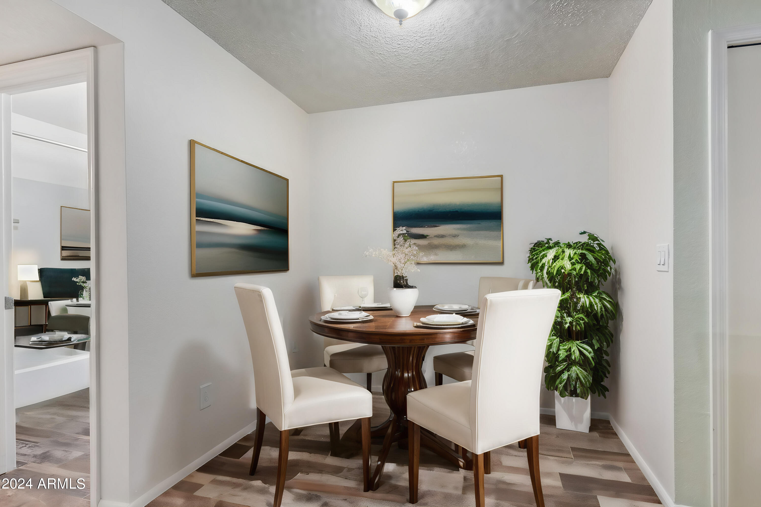 533 West Guadalupe Road, Unit 2046 Mesa, AZ 85210 - Photo 7 of 29 a dining room with furniture and wooden floor