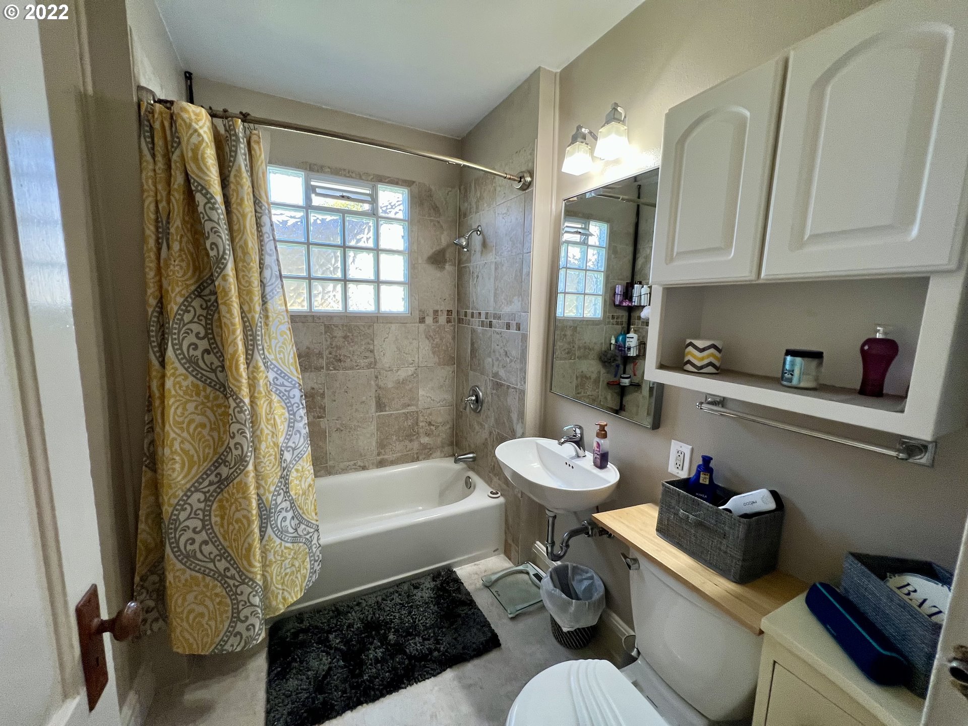 114 Southeast 7th Street Pendleton, OR 97801 - Photo 11 of 14 a bathroom with a sink toilet and shower