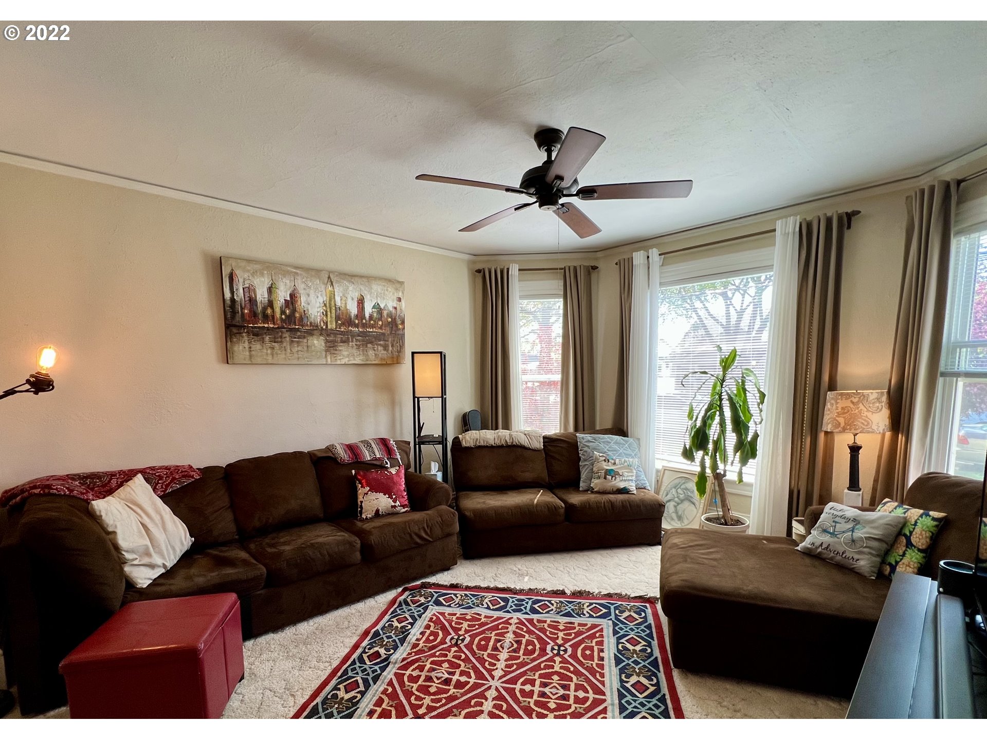114 Southeast 7th Street Pendleton, OR 97801 - Photo 6 of 14 a living room with furniture and a large window