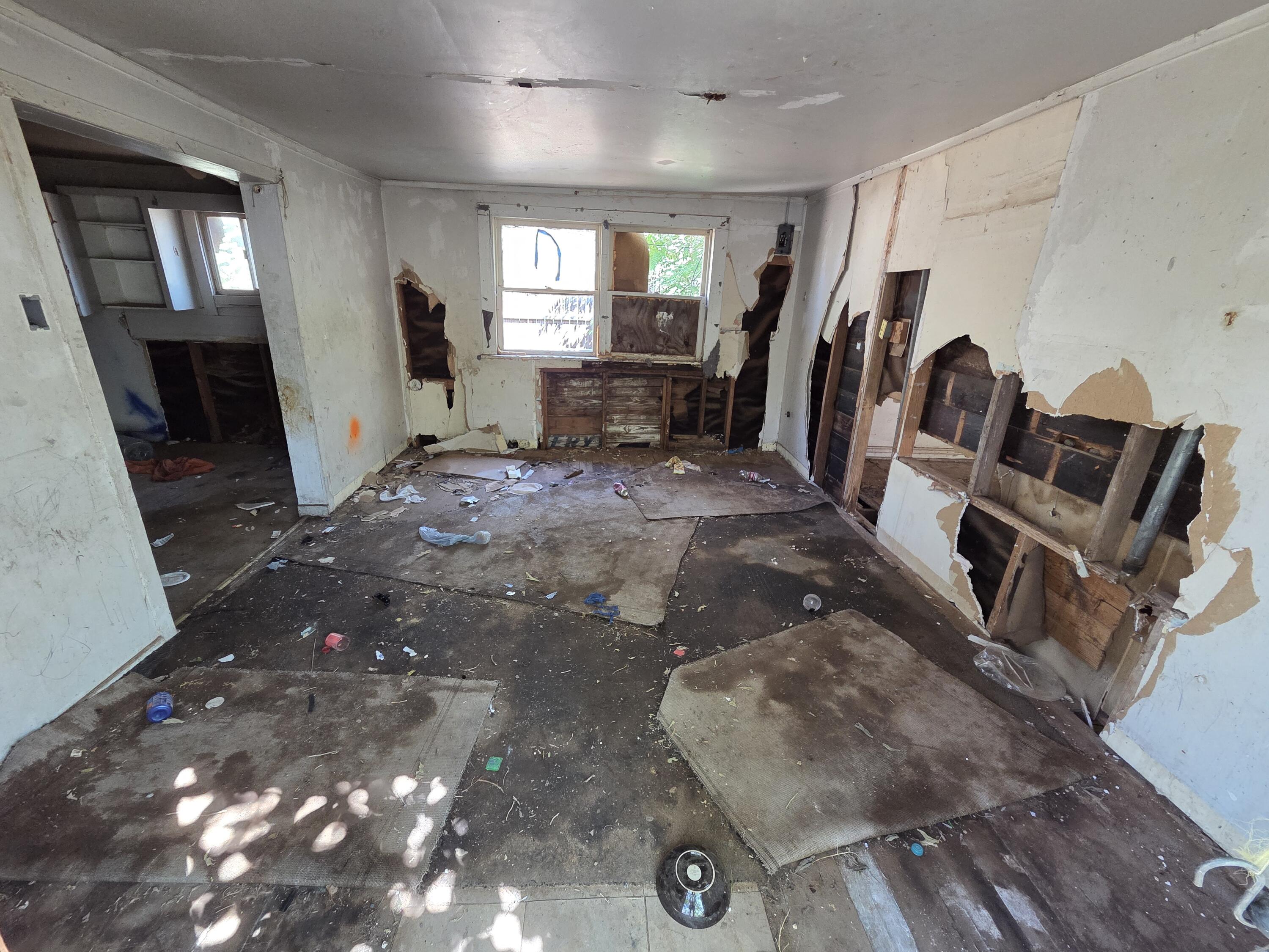1106 35th Street Lubbock, TX 79412 - Photo 11 of 15 a view of a livingroom with furniture and windows