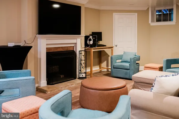 a living room with furniture a flat screen tv